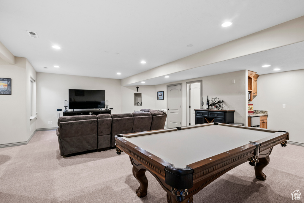 Rec room with recessed lighting, visible vents, and light carpet