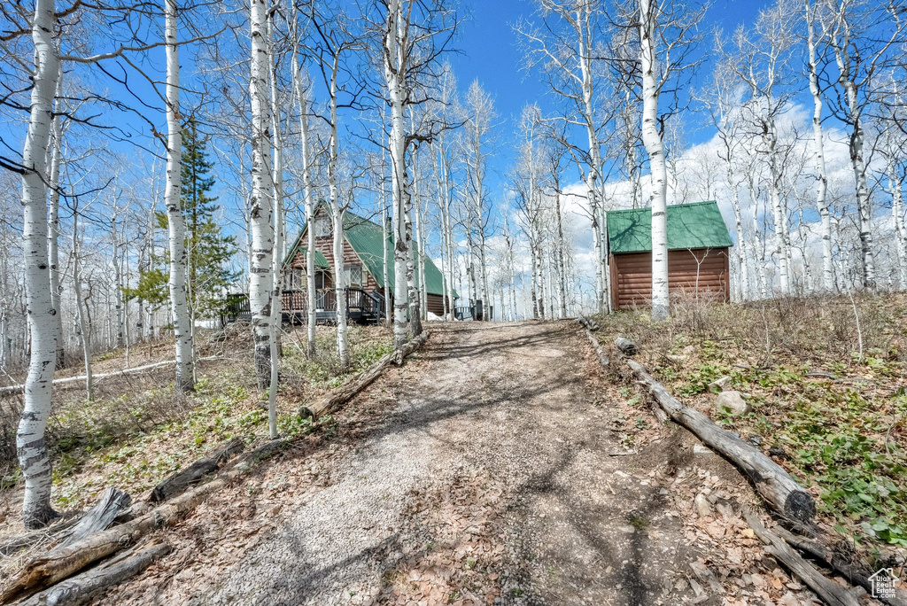 View of community with an outbuilding