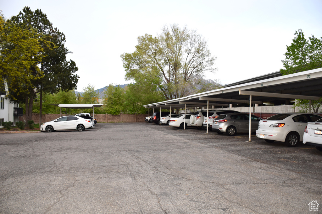 Covered parking lot with fence