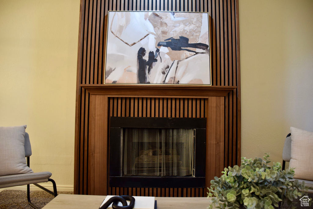 Details with baseboards and a fireplace