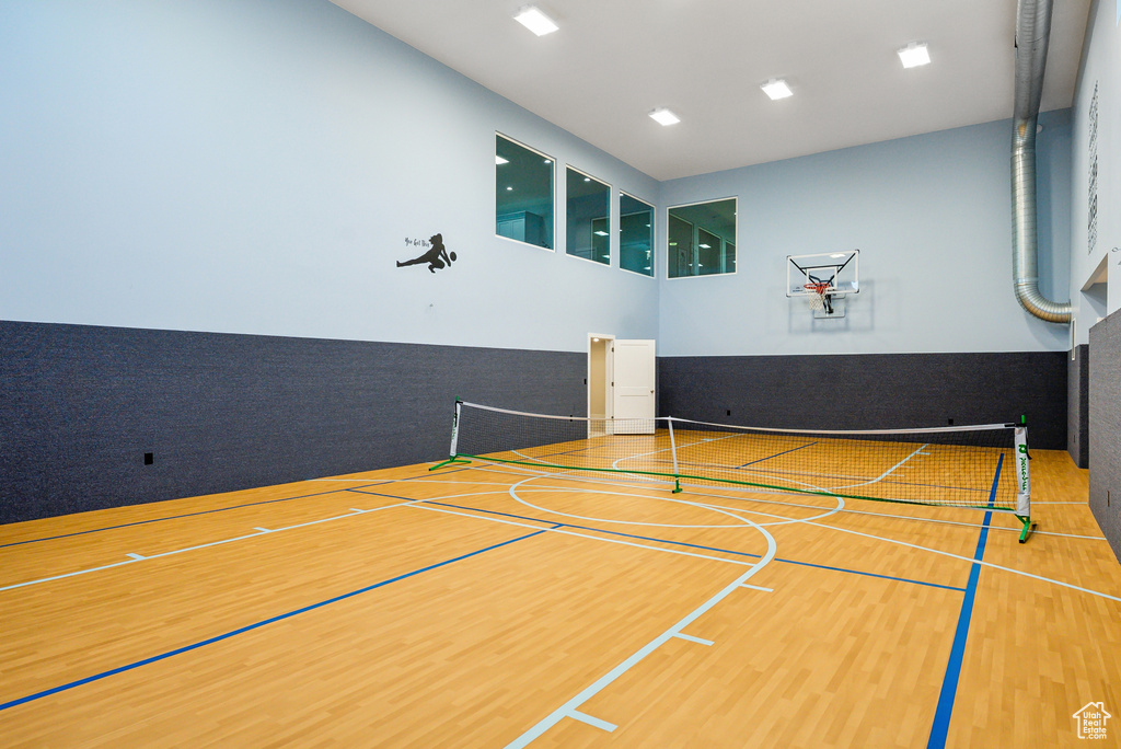 View of basketball court with a tennis court and community basketball court