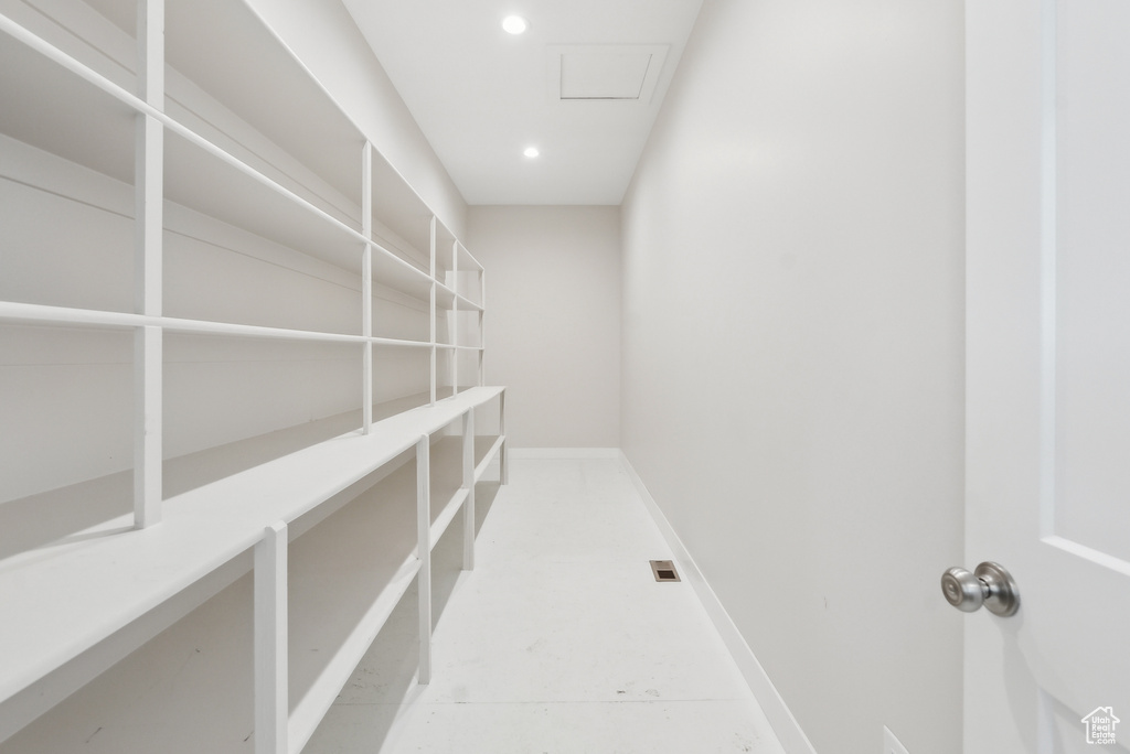 Interior space featuring attic access