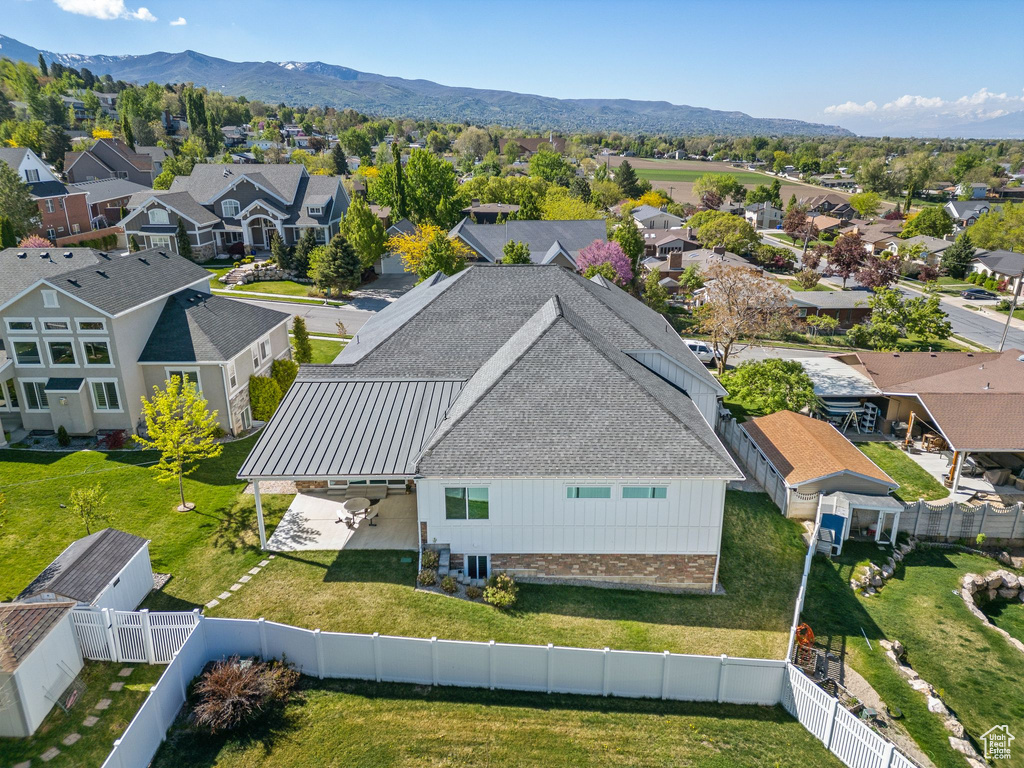 Aerial view featuring a mountain view and a residential view
