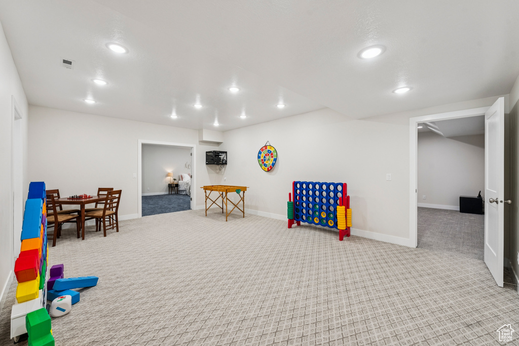 Playroom featuring carpet floors, recessed lighting, and baseboards