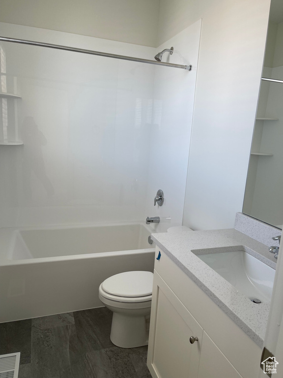 Bathroom featuring vanity, shower / bathing tub combination, toilet, and visible vents
