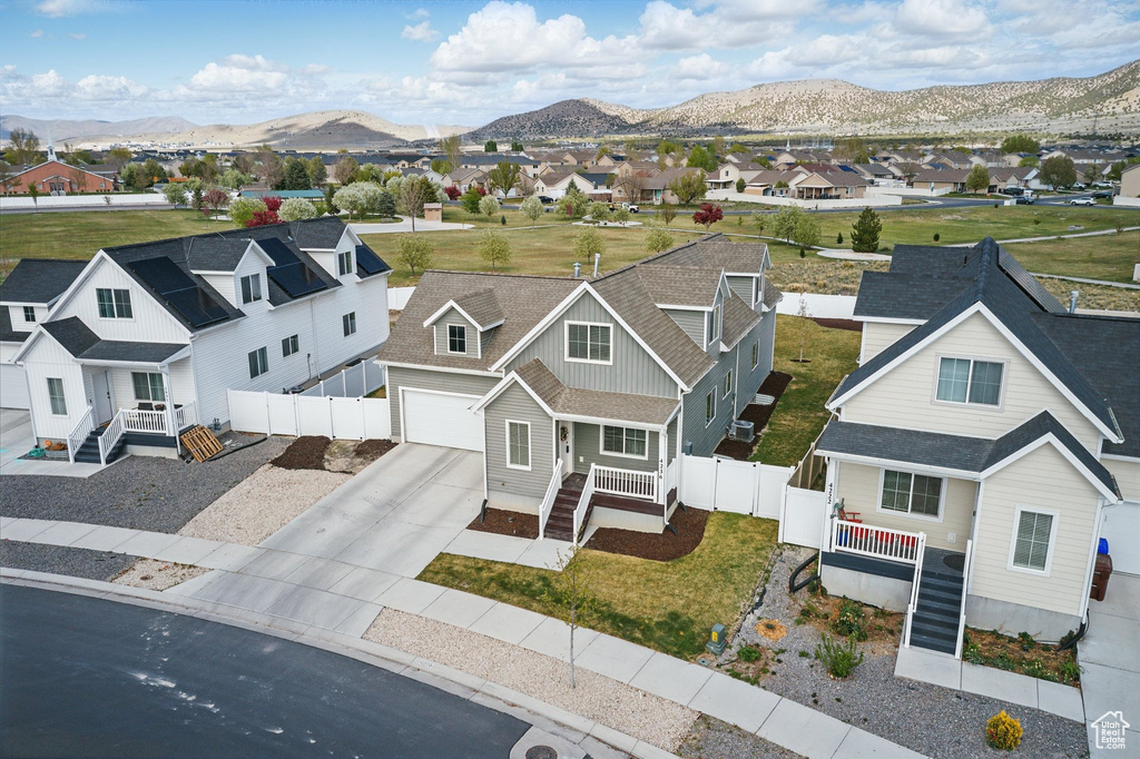 Birds eye view of property featuring a residential view and a mountain view