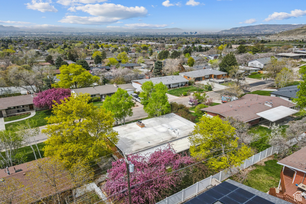 Drone / aerial view with a residential view and a mountain view