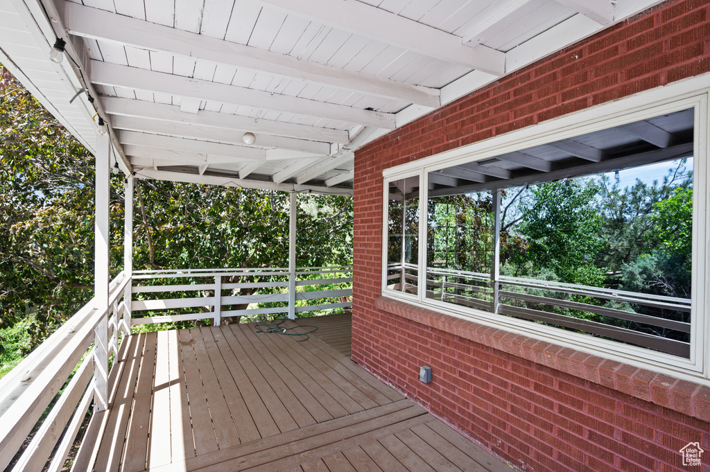 Deck with view of scattered trees