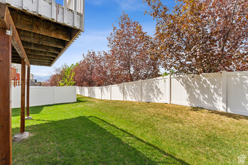 View of yard with a fenced backyard