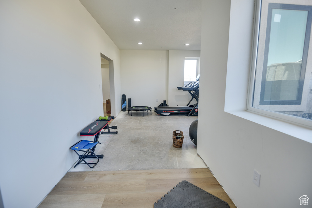 Workout area featuring recessed lighting