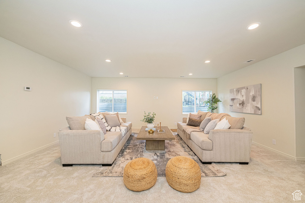 Living room featuring plenty of natural light and recessed lighting