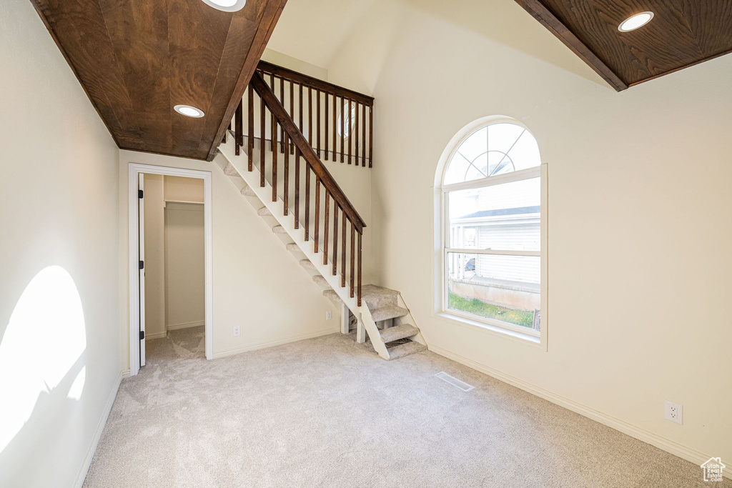 Interior space with recessed lighting, baseboards, and carpet