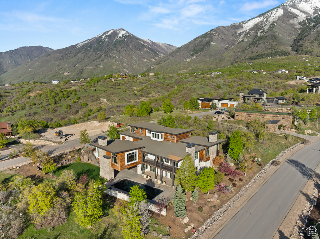 Aerial overview of property's location with mountains