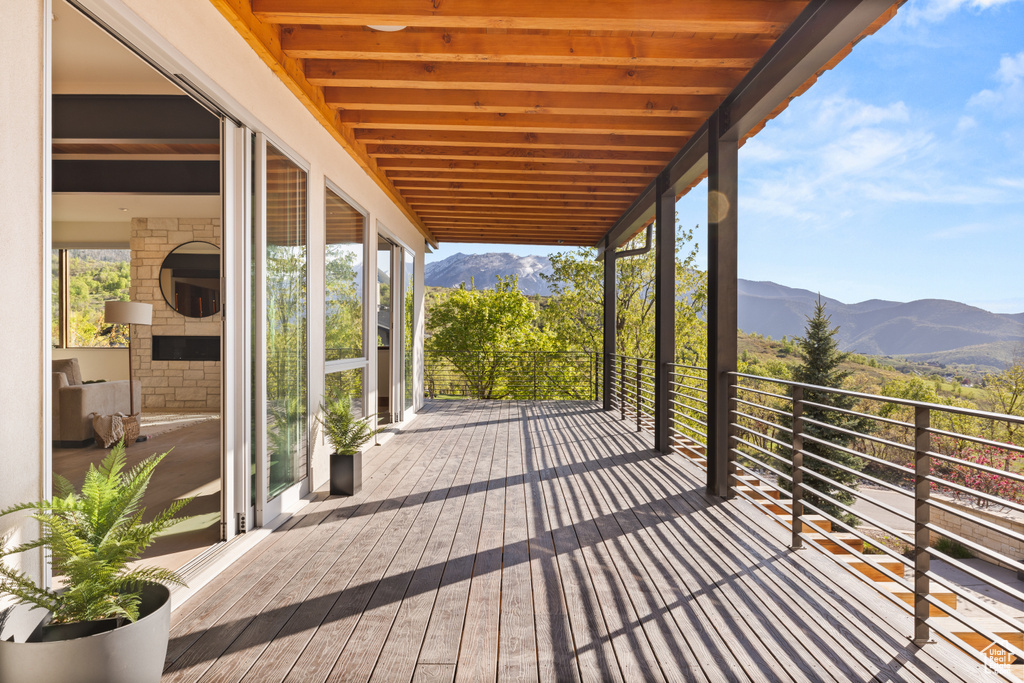 Wooden deck featuring a mountain view