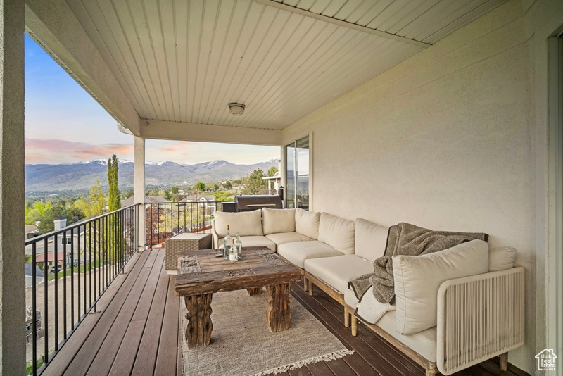 Balcony with outdoor lounge area and a mountain view