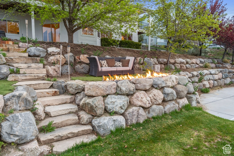 Exterior space with a fire pit