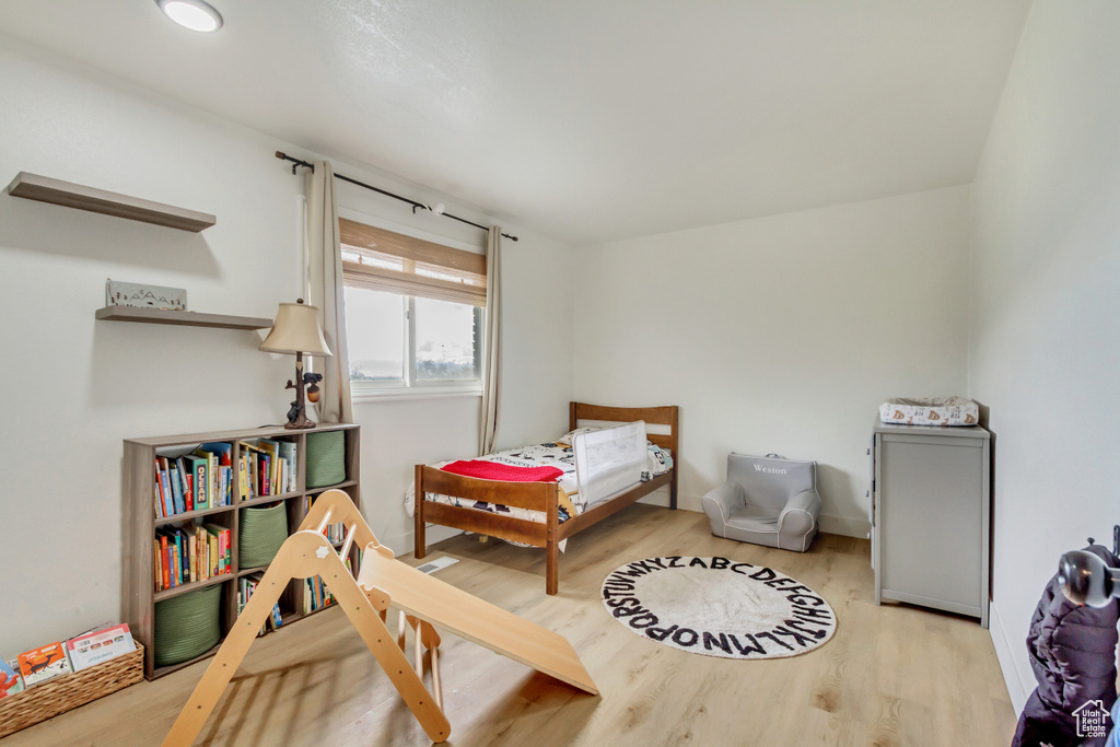 Bedroom featuring wood finished floors