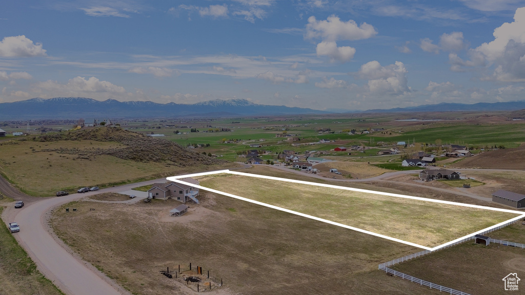 Drone / aerial view featuring a mountain view and a rural view