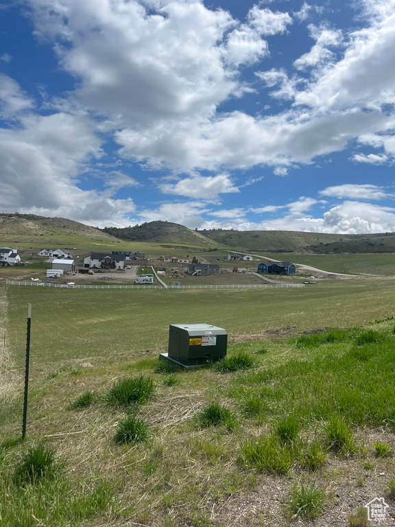 View of mountain feature with a rural view