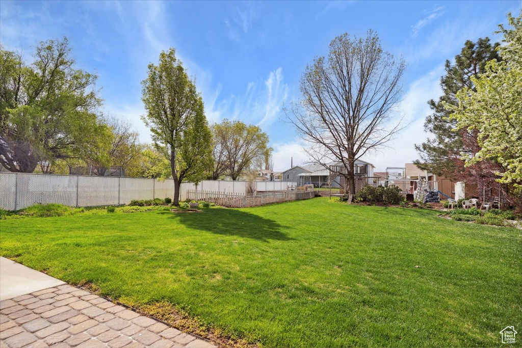 View of yard with fence
