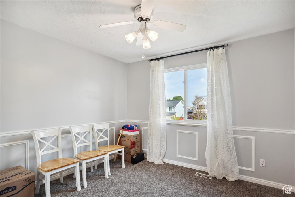 Rec room with baseboards, ceiling fan, carpet, and visible vents