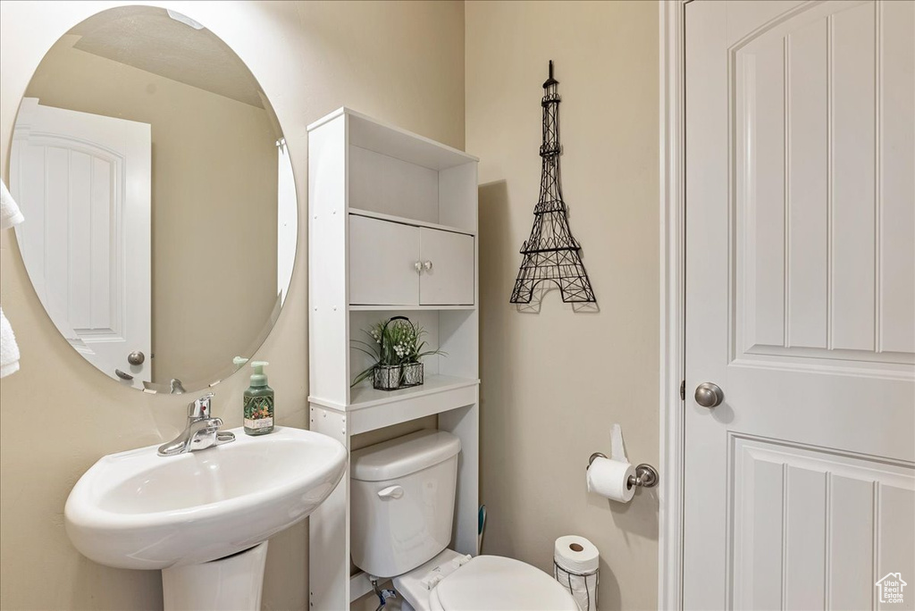 Bathroom with a sink and toilet
