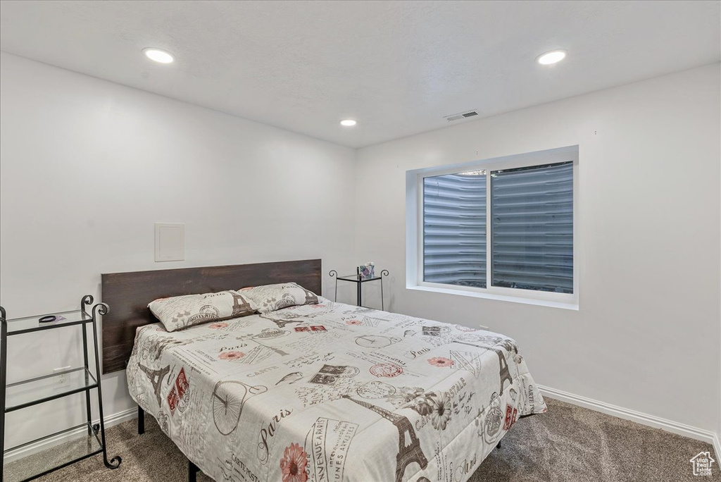 Bedroom featuring baseboards, carpet flooring, recessed lighting, and visible vents