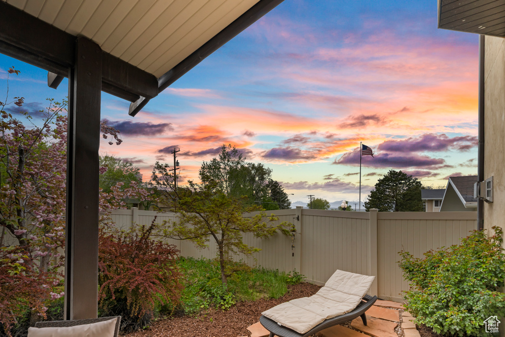 View of patio with fence