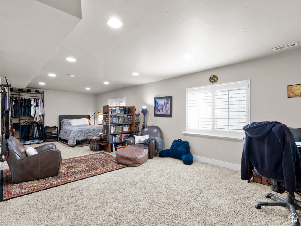 Bedroom with visible vents, baseboards, carpet flooring, and recessed lighting