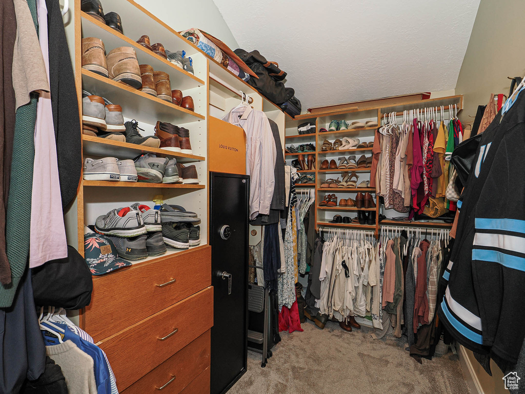 Walk in closet featuring carpet flooring