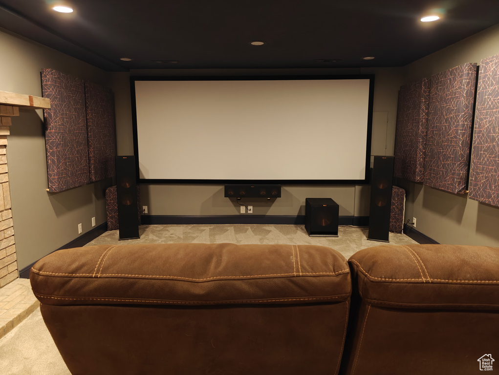 Carpeted home theater room featuring recessed lighting