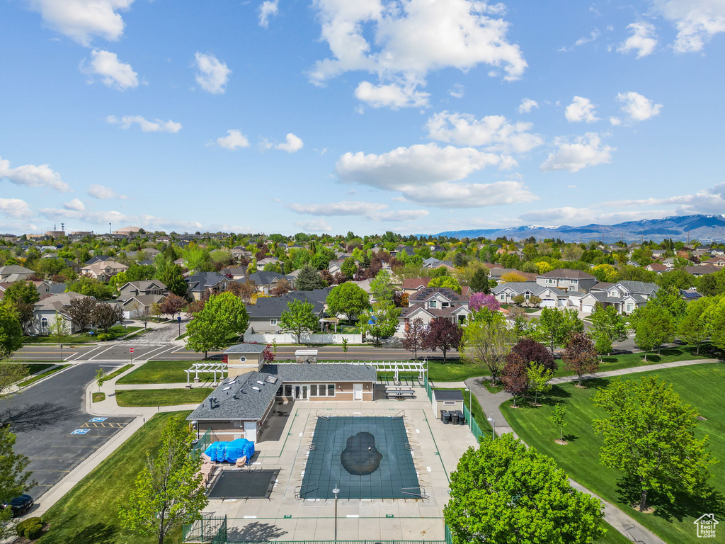 Drone / aerial view with a residential view and a mountain view