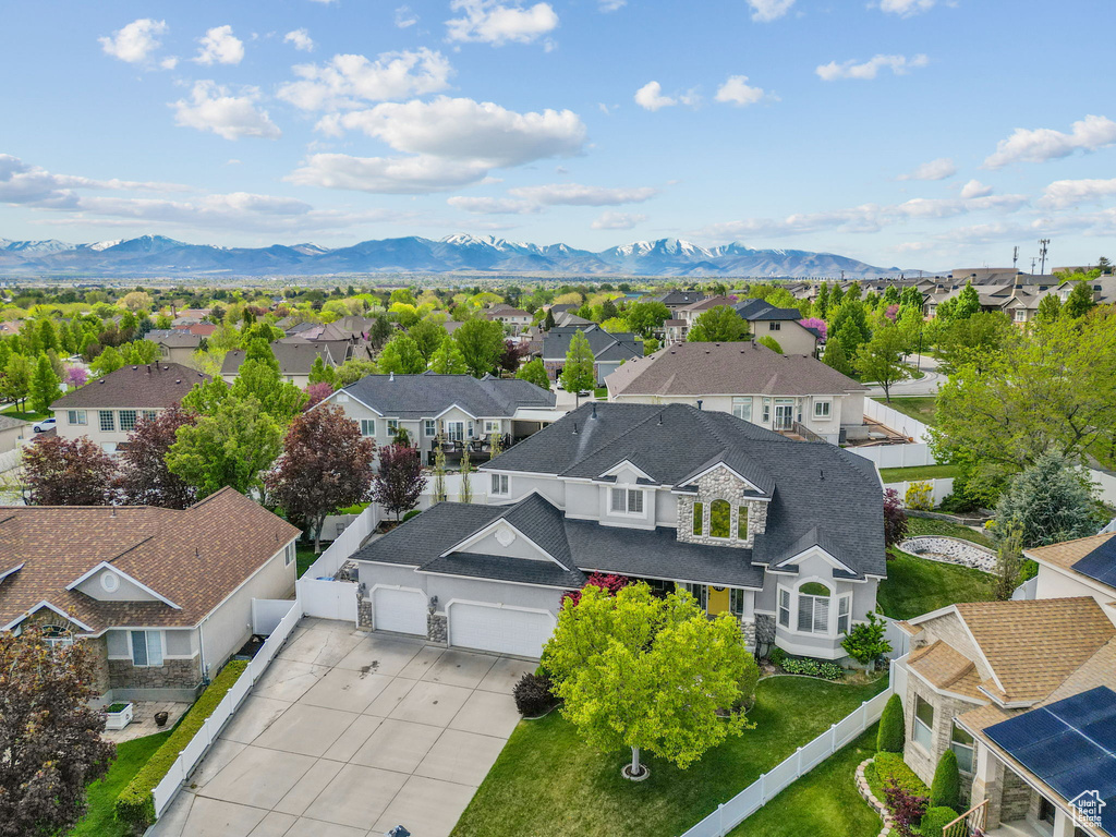 Drone / aerial view featuring a residential view and a mountain view