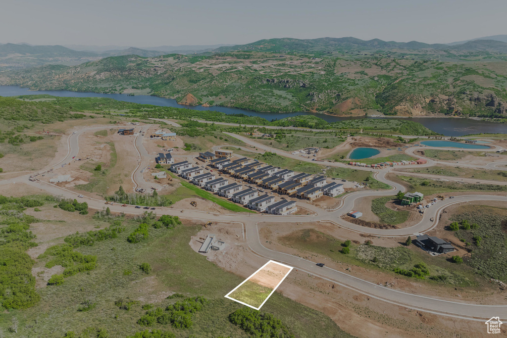 Bird's eye view with a water and mountain view