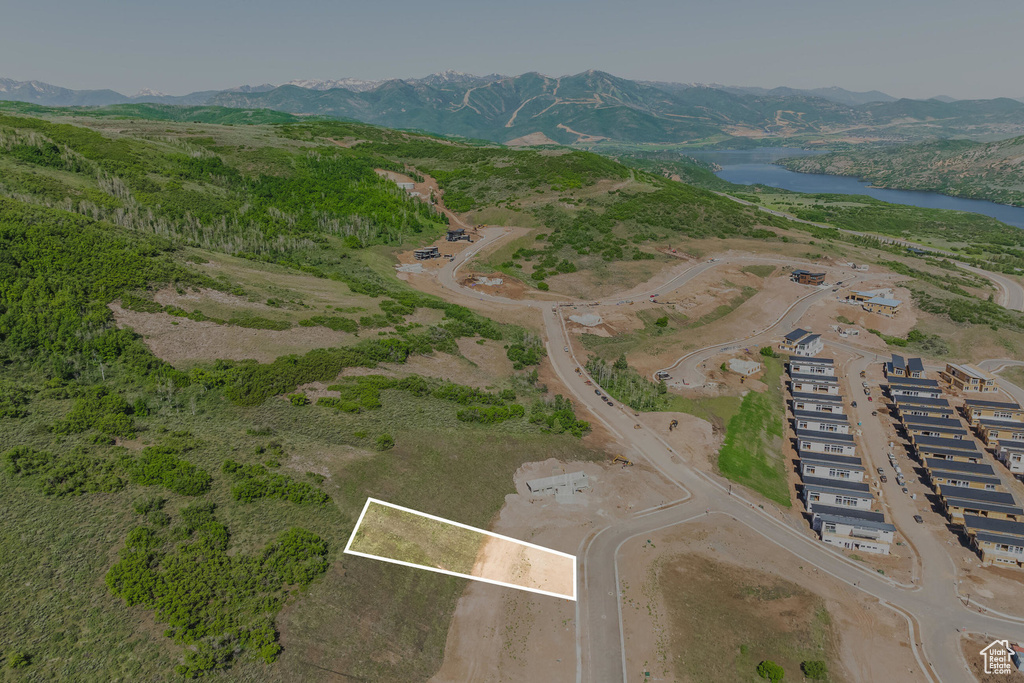 Bird's eye view featuring a water and mountain view