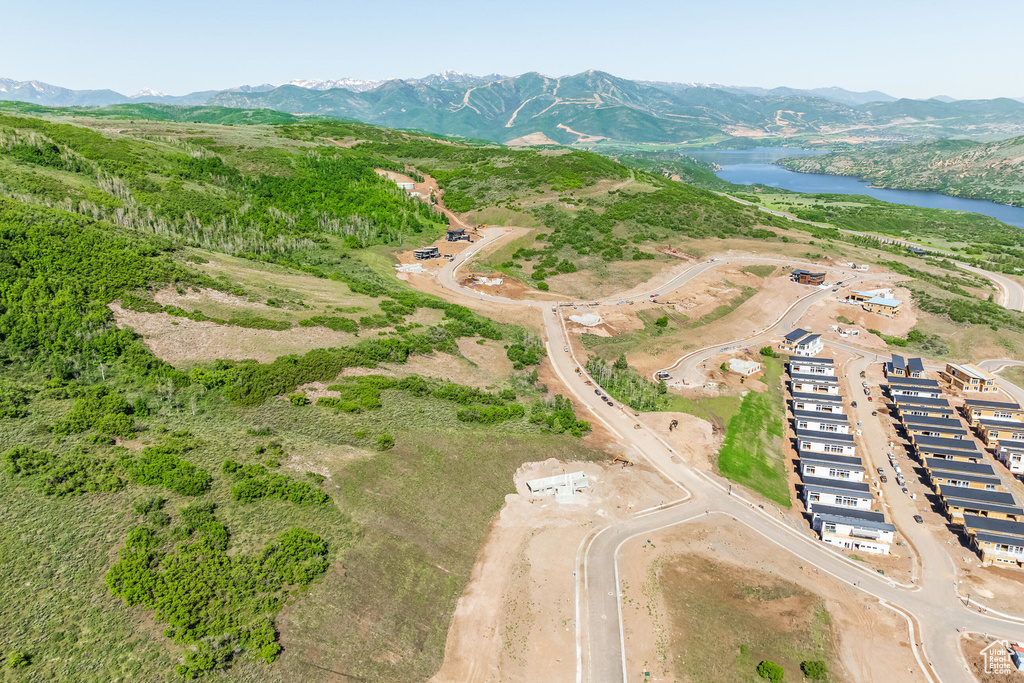 Bird's eye view with a water and mountain view