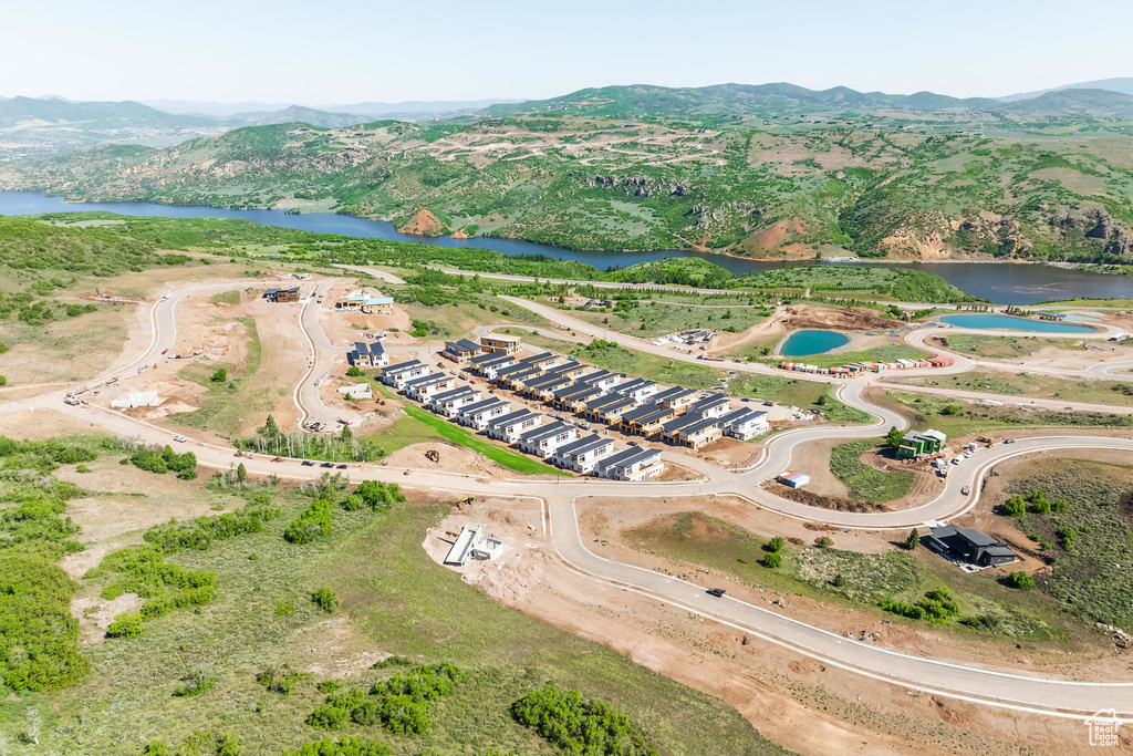 Bird's eye view with a water and mountain view