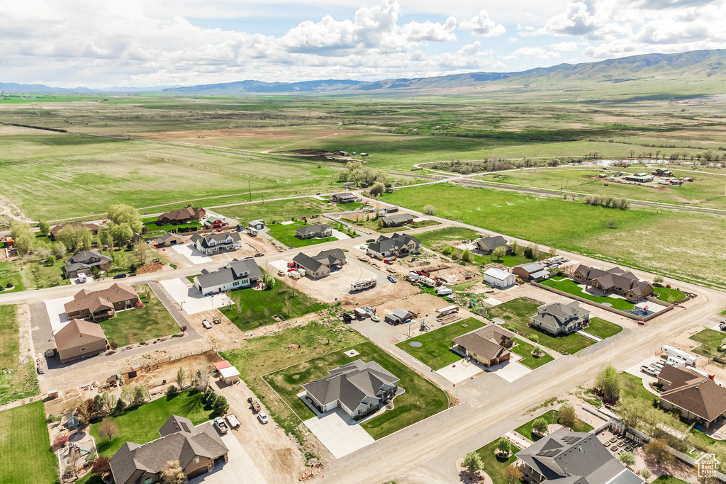 Bird's eye view with a residential view, a mountain view, and a rural view