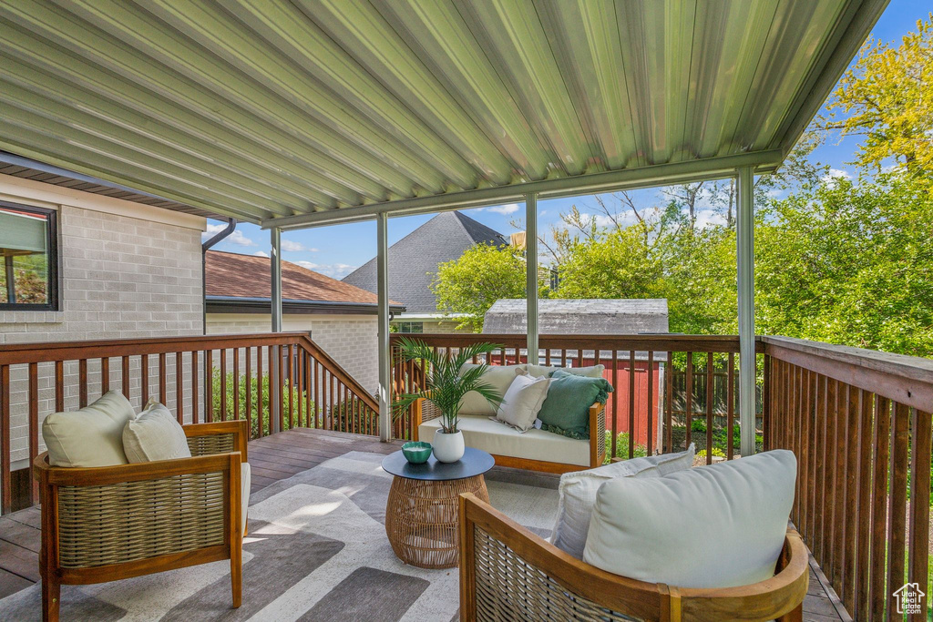 Deck featuring outdoor lounge area
