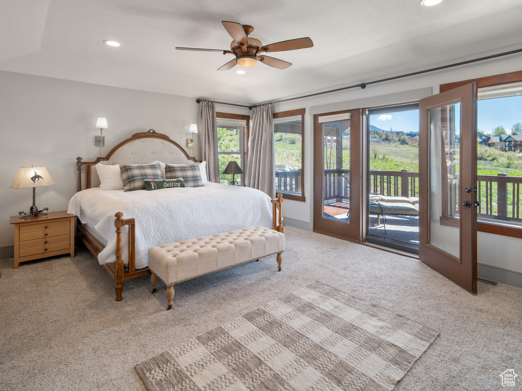 Bedroom featuring carpet floors, recessed lighting, and access to exterior