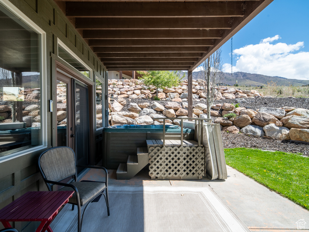 View of patio / terrace featuring a mountain view
