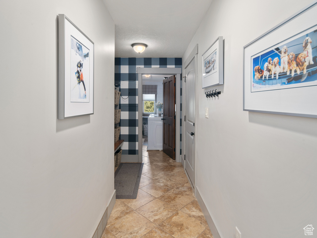 Hall featuring baseboards
