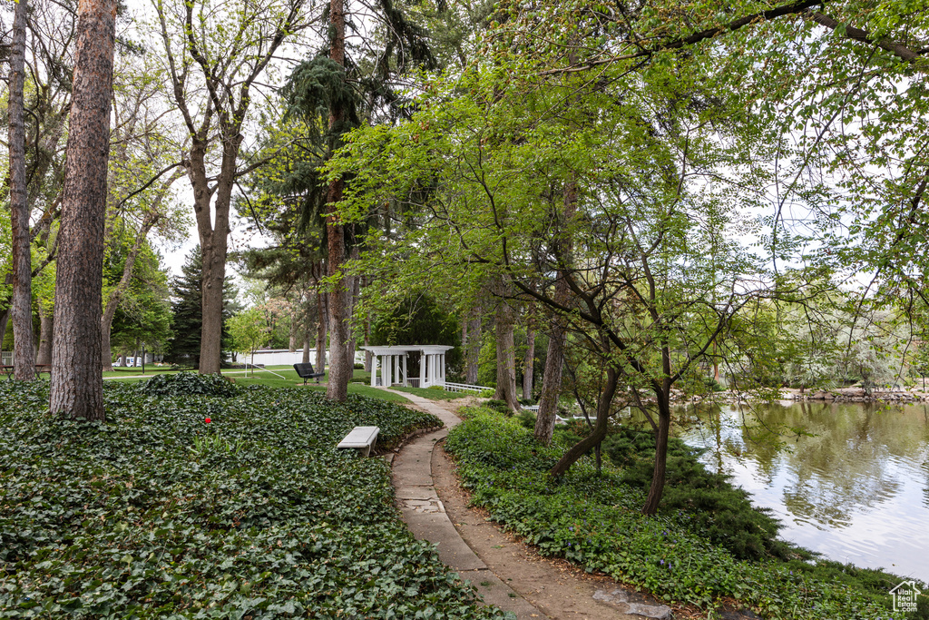 Surrounding community featuring a water view