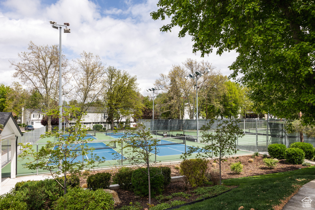 View of tennis court with fence