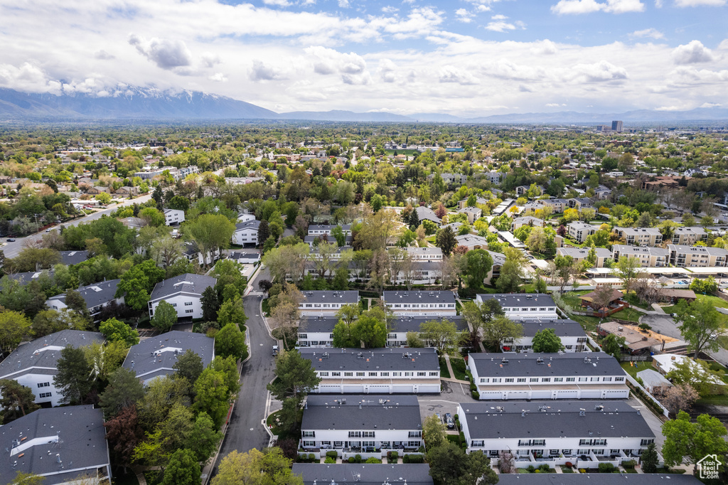 Birds eye view of property with a mountain view