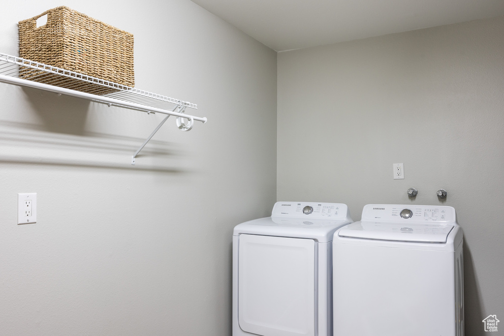 Clothes washing area with laundry area and washer and clothes dryer