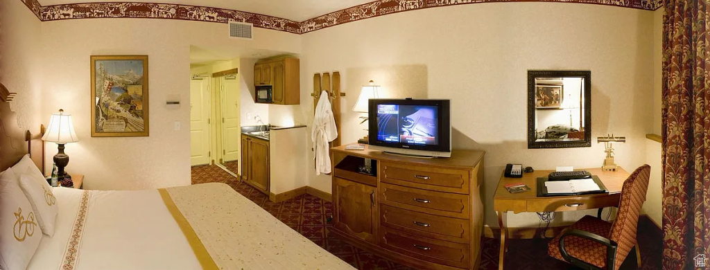 Bedroom with visible vents and ensuite bath