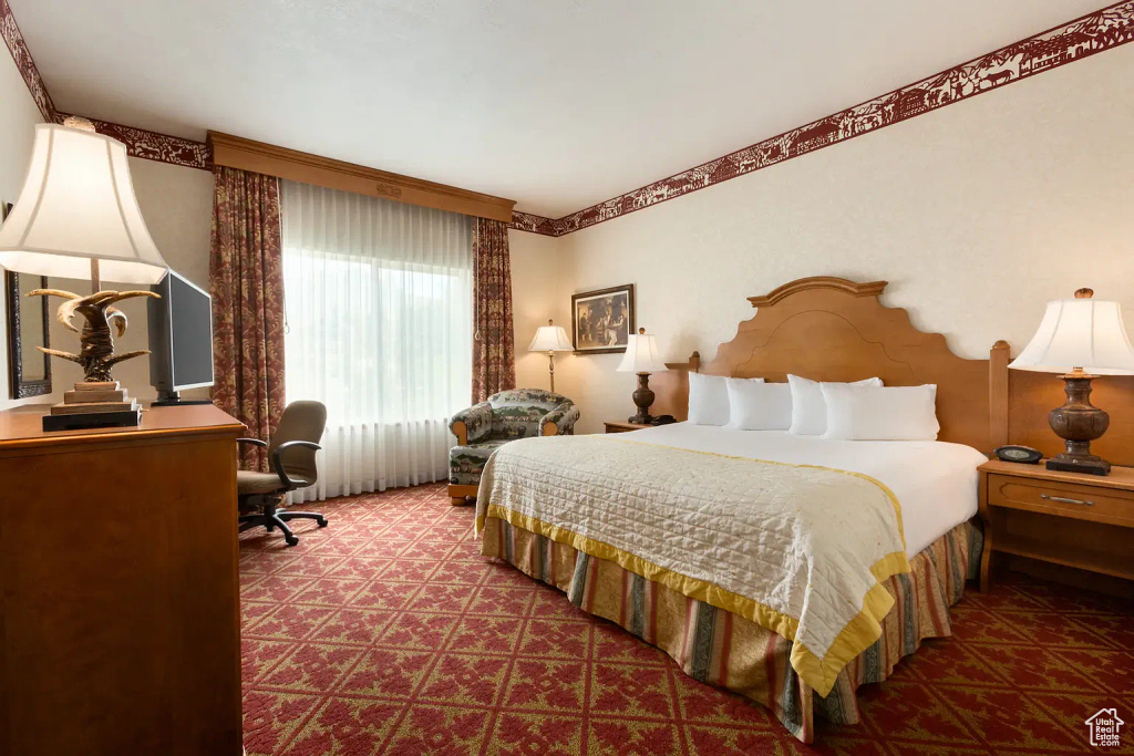 Bedroom featuring carpet floors