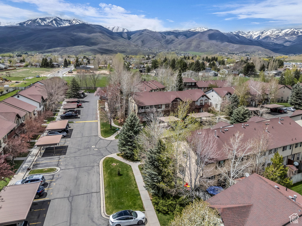Drone / aerial view featuring a residential view and a mountain view