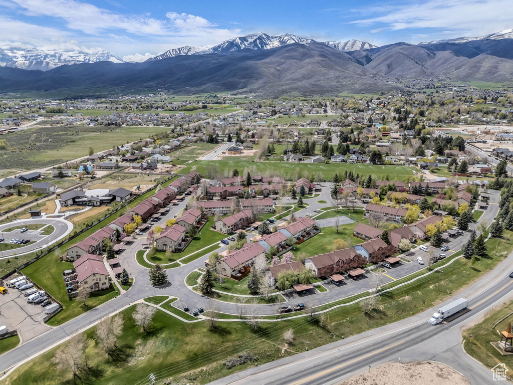 Drone / aerial view featuring a mountain view and a residential view
